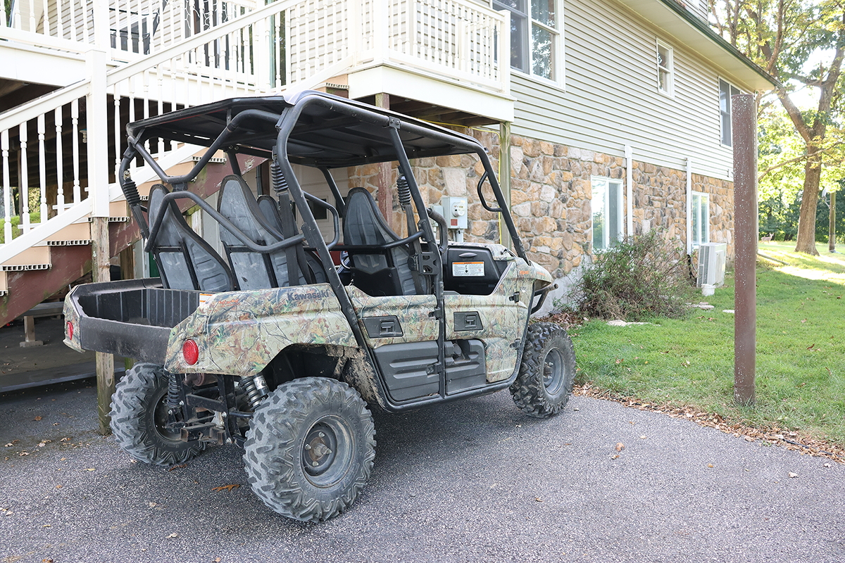 PVA-side-by-side Paradise Valley Adventure's ATV with whitetail deer in background